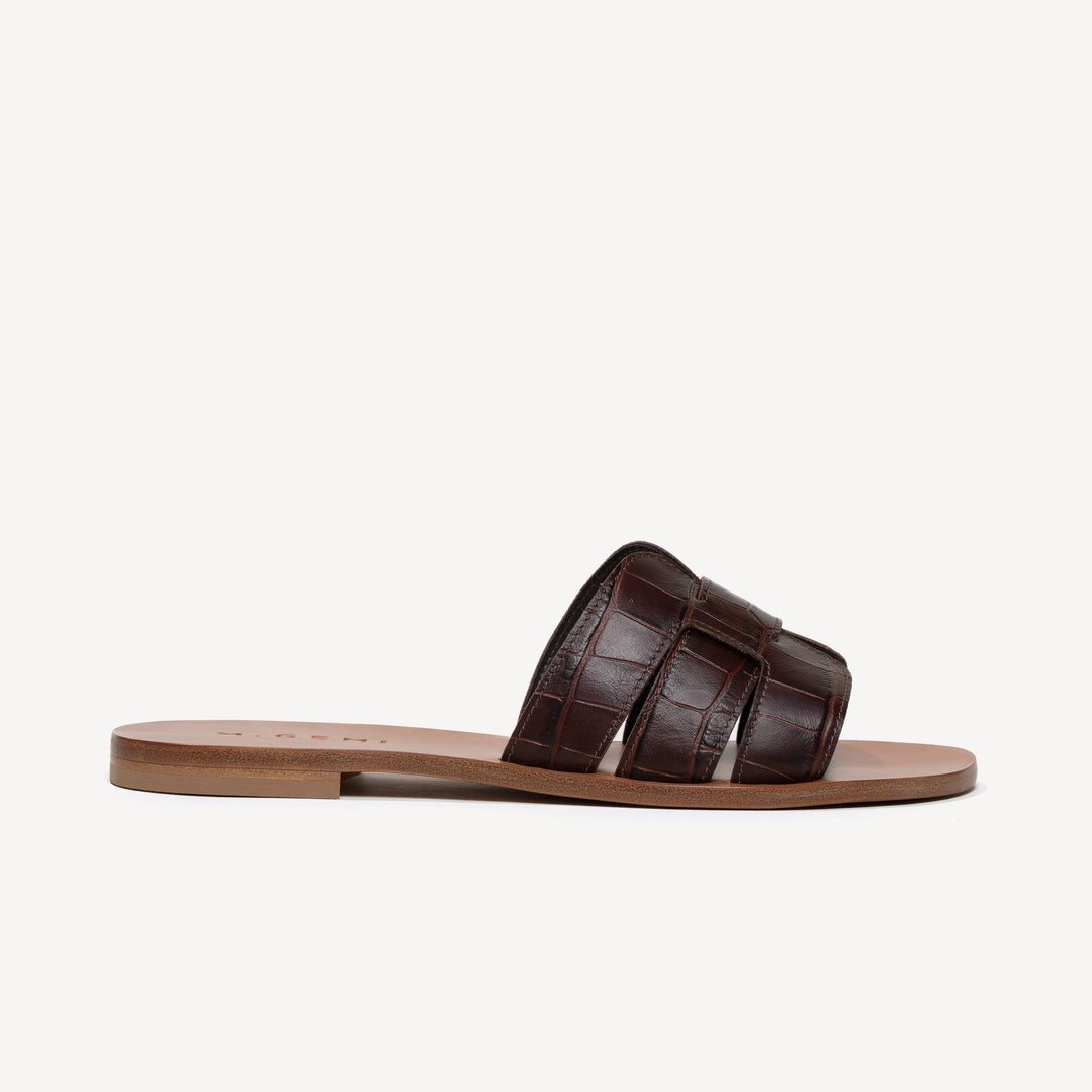 Quintessential Technique leather sandal.