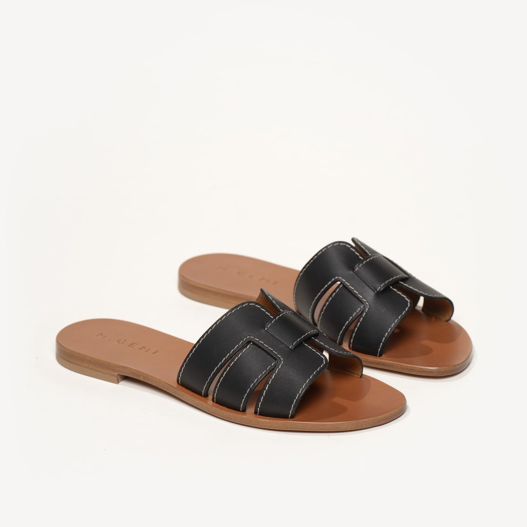 Quintessential Technique leather sandal.